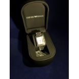 Emporio Armani - a stainless steel wristwatch of tank shape with rectangular starburst central