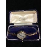 A 9ct J W Benson, London wrist watch, 1920's, circular dial, arabic numerals, gross weight, 24.5