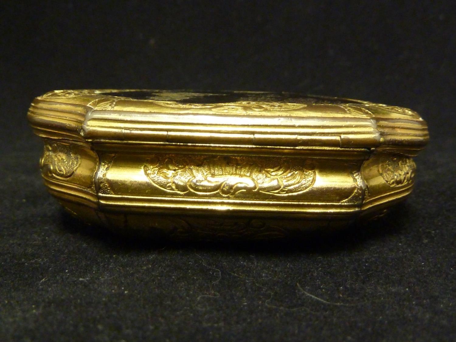 A gilt metal snuff box, in Louis XV style, of bombe form decorated with foliate scrolls and on three - Image 3 of 6