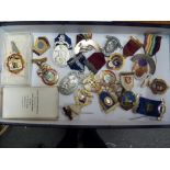 A group of 16 Masonic interest enamel and white metal medallions, including a boxed George Kenning &
