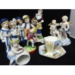 Five German porcelain figures, comprising a pair of 'Twin' figures, each of a boy and a girl; a