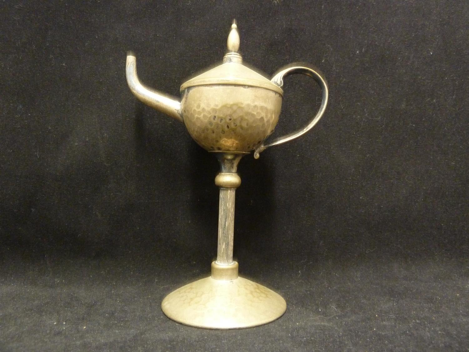 A WMF silvered brass table cigar lighter, of oil lamp form on tall stem, 18cm high