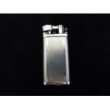 Alfred Dunhill - a Unique cigarette lighter, silver finish, circa 2006; paperwork, box and