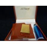 S J Dupont - A 'D line' gold finish cigarette lighter with horizontal stripe design, original pouch,