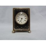 A silver pique work miniature carriage clock, with french movement, the silver box frame on four