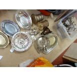 A quantity of silver plated wares, including a pair of champagne bottle coasters (qty)