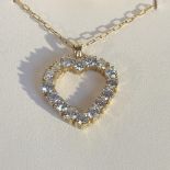 A diamond heart form pendant, set with sixteen round brilliant cut diamonds, weighing est 3.70ct,