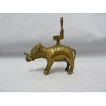 An Indian brass incense burner temple toy, formed as an elephant with elaborate howdah, 19th