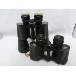 Two pairs of binoculars, comprising a Carl Zeiss pair, Jenoptem 8 x 30W; and Prinz 16 x 50 (2)