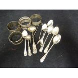 Various table silver - comprising: a pair of napkin rings; 3 other napkin rings; a mustard spoon;