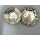 Two Silver bon-bon dishes, one of panelled circular form with wreath and scallop top edge,