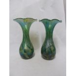 A pair of convolvulus bud form glass vases of nacreous green blue colour, probably from the Isle