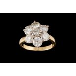 A DIAMOND SEVEN STONE RING. of approx. 3.50ct G-K P1, mounted in 18ct yellow gold