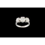 A DIAMOND THREE STONE RING, three old European cut diamonds of 2.90ct in total H/I VS.