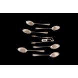 A SET OF SIX EDWARDIAN SILVER COFFEE SPOONS with shell bowls and matching tongs, Sheffield, 1908