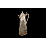 A SILVER MOUNTED CUT CRYSTAL CLARET JUG, Sheffield