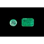 TWO LOOSE EMERALDS, one emerald cut emerald of approx. 2.00ct; together with a round mixed cut