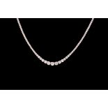 A GRADUATED DIAMOND LINE NECKLACE, of approx. 2.50ct in total G VS, mounted in 18ct white gold