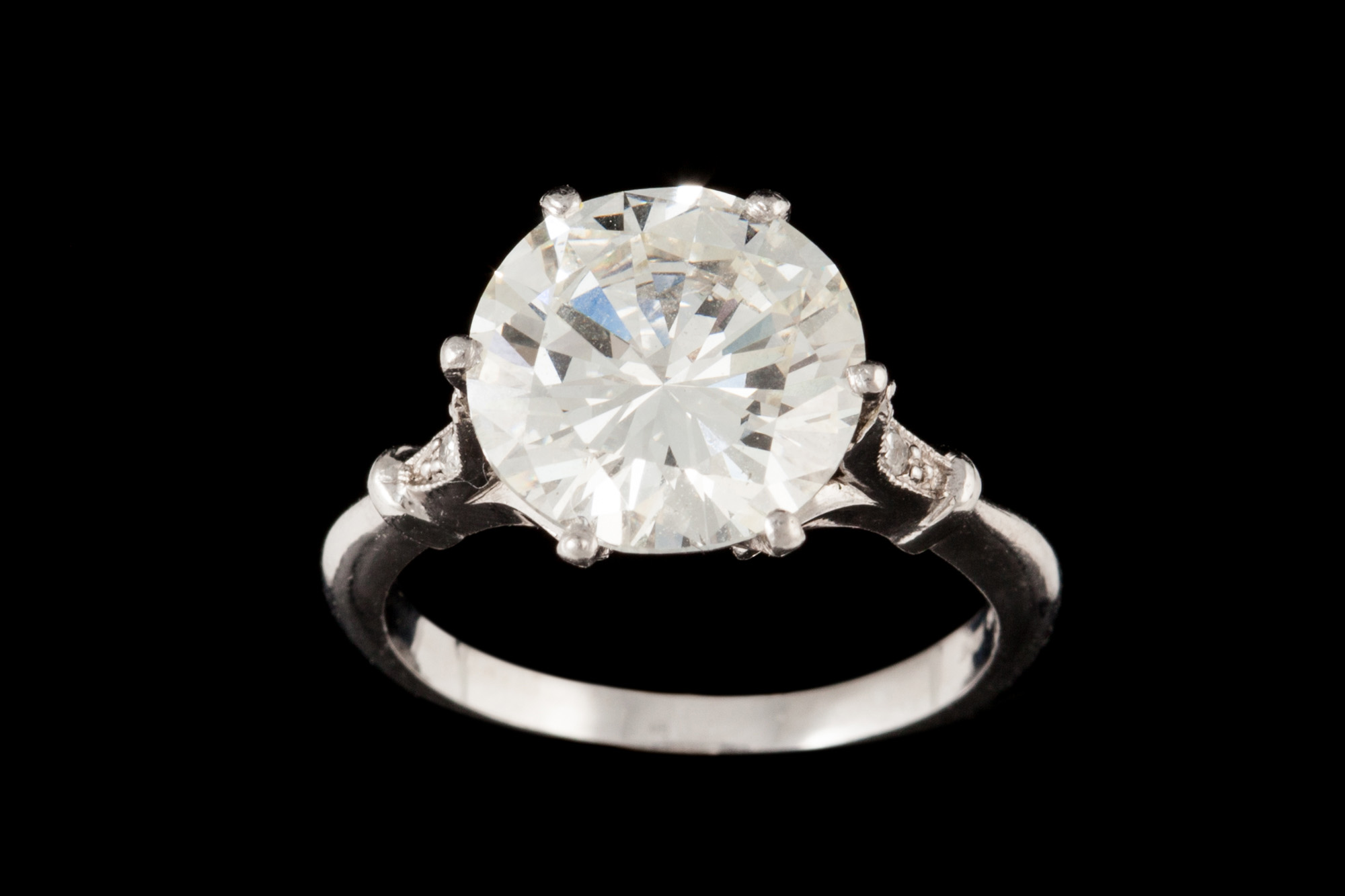 A DIAMOND SOLITAIRE RING, with DCL report stating the diamond to be 5.01ct J/K VS2, mounted in