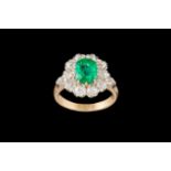 AN EMERALD AND DIAMOND CLUSTER STONE RING, one cushion cut emerald of 1.39ct with gem report, and