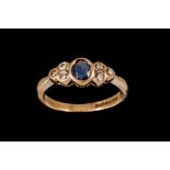 A SAPPHIRE AND DIAMOND DRESS RING, mounted in yellow gold