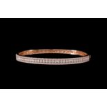 A DIAMOND SET BANGLE, of approx. 2.01ct in total, mounted in 18ct rose gold