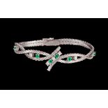 AN EMERALD AND DIAMOND SET BRACELET, mounted in white gold