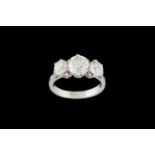 A DIAMOND THREE STONE RING, three old European cut diamonds of 3.27ct in total H-J VS-SI.