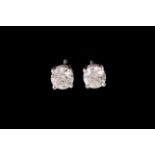 A PAIR OF DIAMOND SOLITAIRE EARRINGS, of approx. 1.02ct in total G/H VS, mounted in 18ct white gold