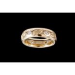 A DIAMOND SET BAND, of approx. 0.54ct in total, mounted in 14ct yellow gold