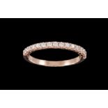 A DIAMOND HALF ETERNITY RING, of approx. 0.24ct in total, mounted in 18ct rose gold