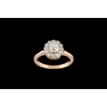 AN ANTIQUE DIAMOND CLUSTER RING, with old cut diamonds of approx 1.50ct in total.