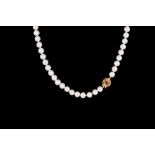 A JAPANESE RIVER PEARL NECKLACE, with 9ct gold clasp, 17''