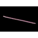 A RUBY BRACELET, mounted in 18ct white gold, French