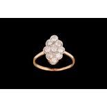 AN ANTIQUE DIAMOND DRESS RING, mounted on 18ct gold