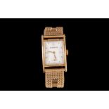 A 14CT GOLD LADIES VINTAGE TIFFANY & CO WRIST WATCH, with rectangular face, white dial, on woven