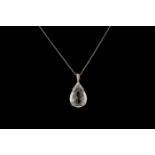 A DIAMOND PENDANT AND CHAIN, one pear shape mixed cut diamond of 7.02ct I/J VS2/SI1, mounted in