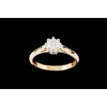 A DIAMOND SOLITAIRE RING, with IGI cert stating the diamond to be 0.61ct F SI2, mounted in 18ct