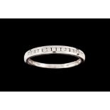 A DIAMOND ETERNITY RING, mounted in white gold, size P/Q