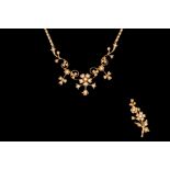 A SEED PEARL SET NECKLACE, mounted on 15ct yellow gold; together with a matching floral brooch