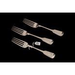 A SET OF THREE GEORGE III IRISH SILVER FIDDLE PATTERN DINNER FORKS by John Pittar, Dublin 1812