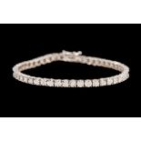 A DIAMOND LINE BRACELET, of approx. 1.00ct in total, mounted in 18ct white gold