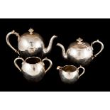 A COLLECTION OF IMPERIAL RUSSIAN SILVER (.875), comprising of a tea pot, coffee pot, a twin