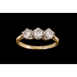 A DIAMOND THREE STONE RING, of approx. 1.00ct in total H/I SI, mounted in 18ct yellow and white