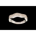 A DIAMOND BAND RING, with diamonds of approx. 0.70ct in total, mounted in 18ct white gold