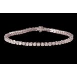 A DIAMOND LINE BRACELET, of approx. 7.00ct in total