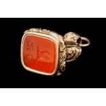 AN ANTIQUE CARNELIAN AND GOLD SEAL