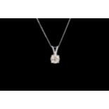 A LIGHT YELLOW DIAMOND SOLITAIRE PENDANT, of approx. 0.79ct, PIII, mounted on 9ct white gold chain