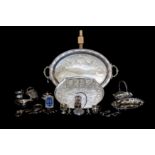 A LARGE SILVER PLATED TWIN HANDLED SERVING TRAY; together with a large collection of silver plated