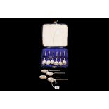 A SET OF SIX SILVER APOSTLE SPOONS, Sheffield, cased; together with four silver seal top spoons,